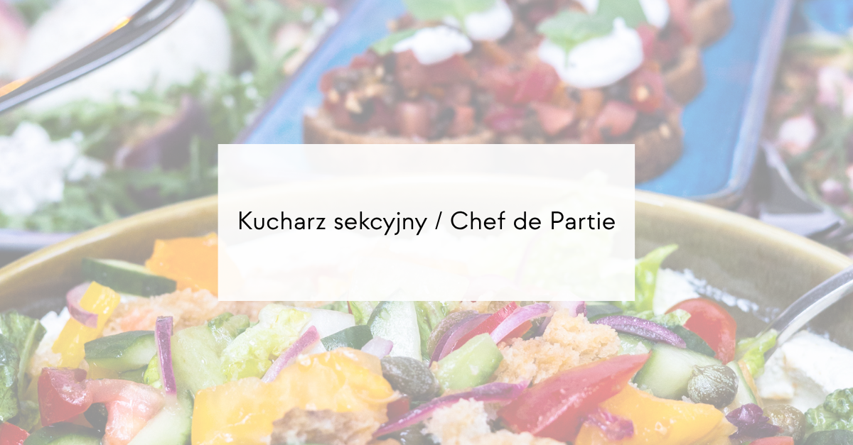 Colorful plated salads in a busy kitchen, illustrating a Chef de Partie role